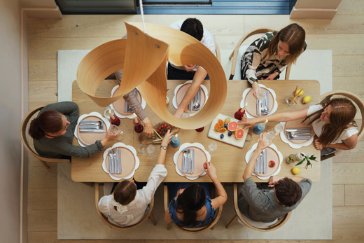 Should dining chairs be lighter or darker than the dining table?