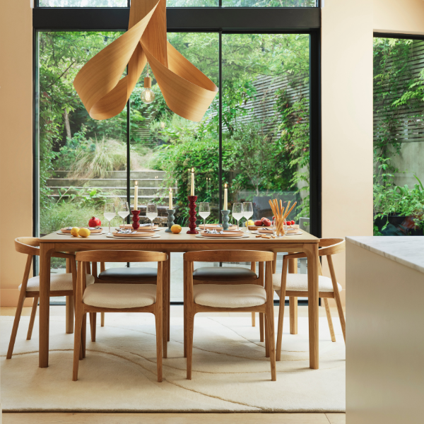 Which dining chairs should I pair with a round dining table?