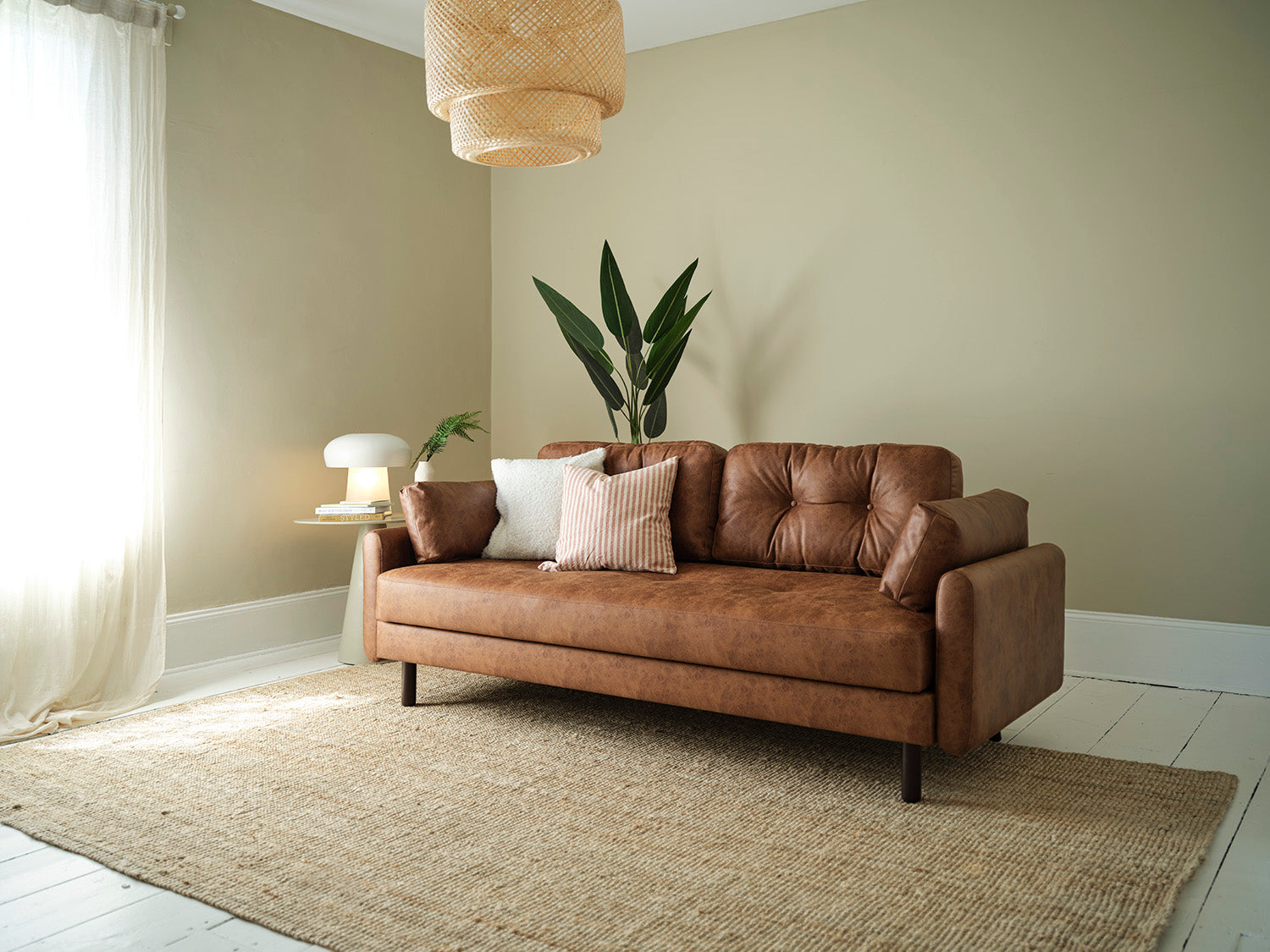 Medium brown leather deals couch