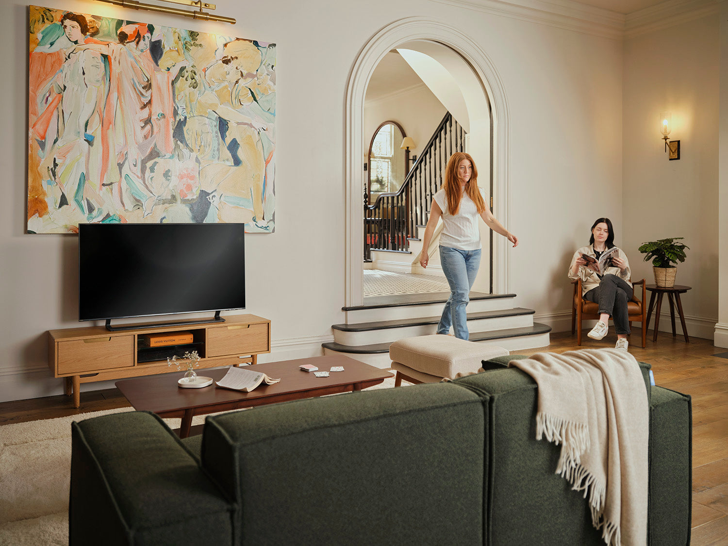 tv unit 01 in living room with green sofa
