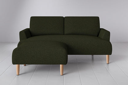 Ottoman in green bouclé with oak legs