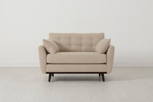 Loveseat in cream linen