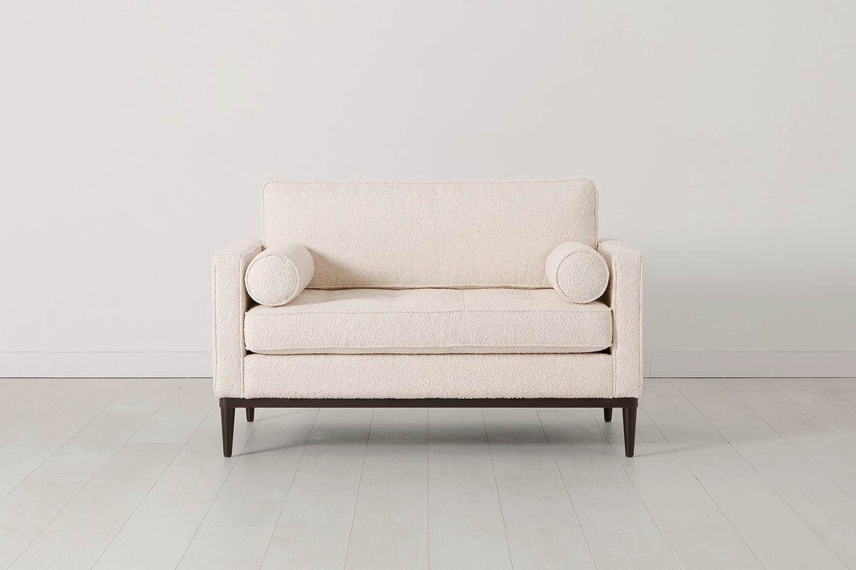 Loveseat in cream bouclé