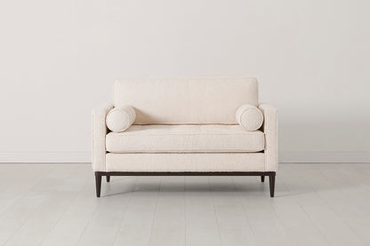 Loveseat in cream bouclé