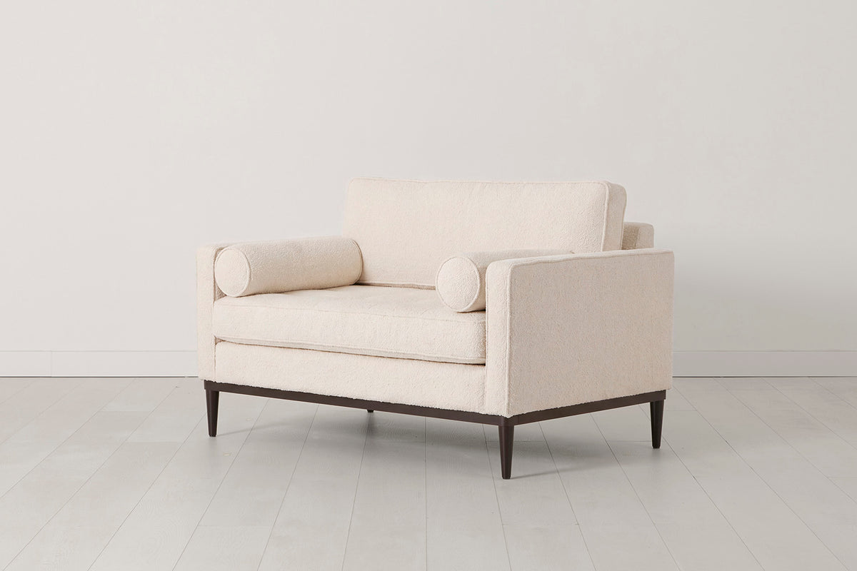 Loveseat in cream bouclé