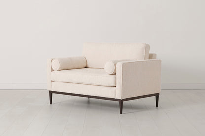 Loveseat in cream bouclé