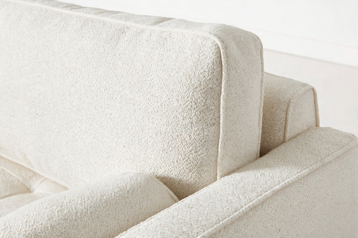 Loveseat in cream bouclé