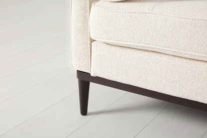 Loveseat in cream bouclé