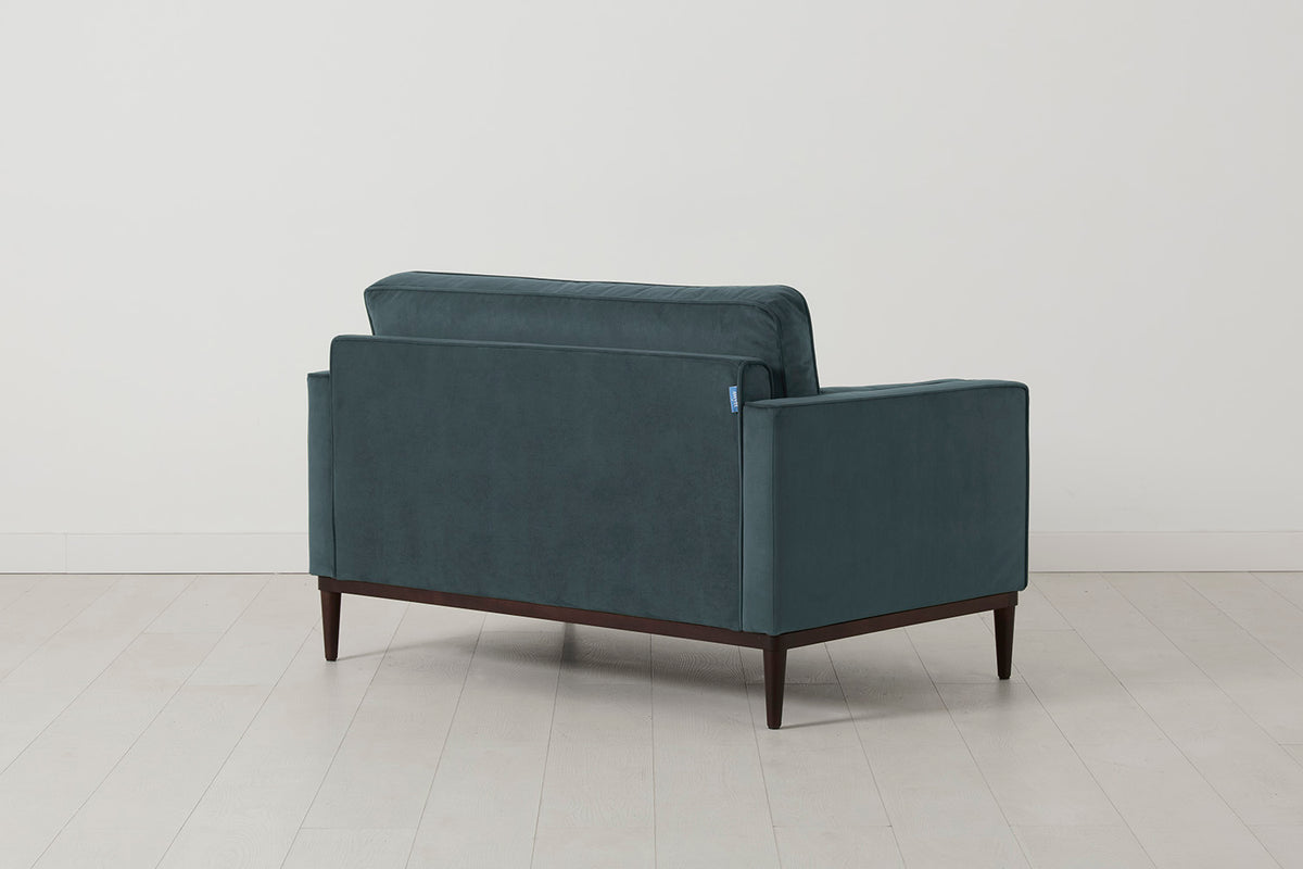 Loveseat in blue velvet