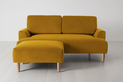 Ottoman in yellow velvet with oak legs