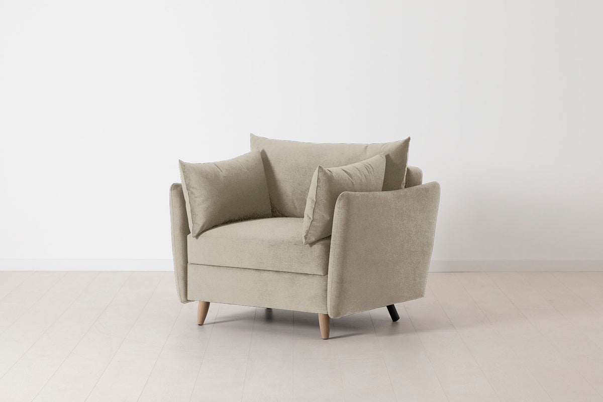 Single Chair Bed in cream chenille with oak legs