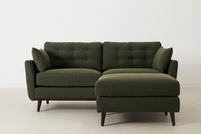 Ottoman in green bouclé